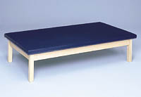 upholstered stationary mat table