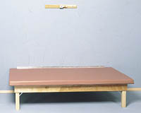 wall mounted upholstered top mat platform in DOWN position